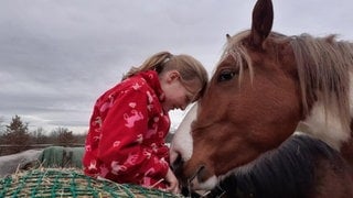 Mädchen mit Pferd